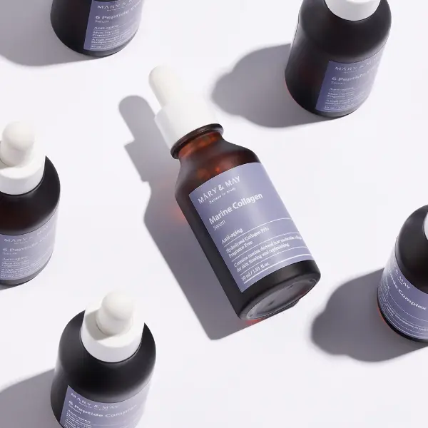 Εφαρμογή MARY & MAY Marine Collagen Serum για αντιγήρανση και λάμψη